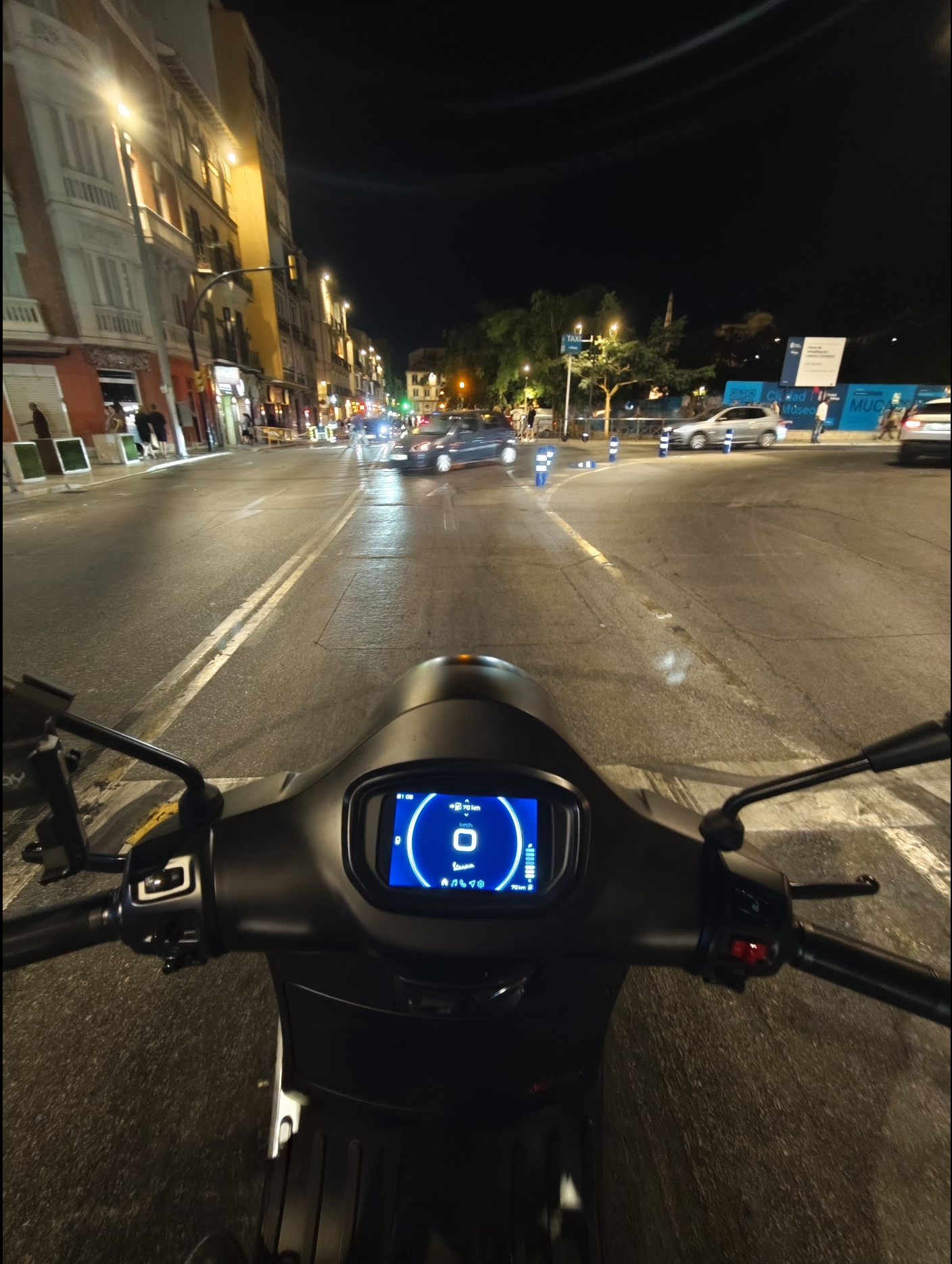 On my Vespa in Málaga at night
